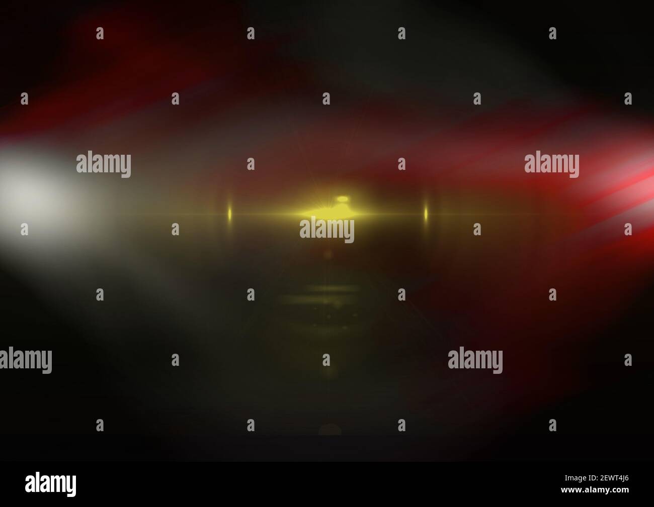 Leuchtende weiße, rote und gelbe Lichtflecken und Lichtspuren auf schwarzem Hintergrund Stockfoto