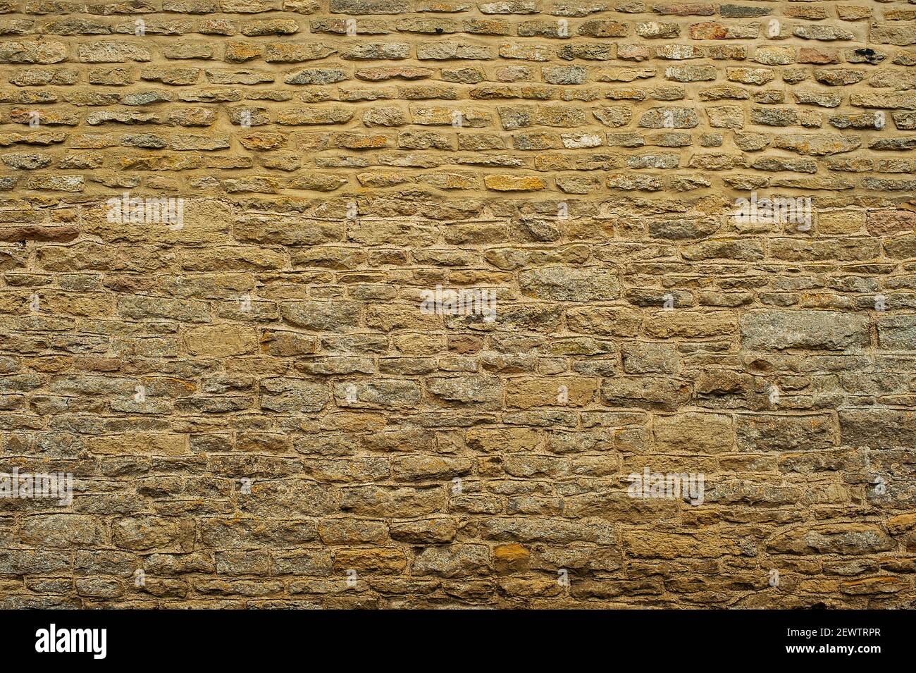 Warme Sandsteinwand Stockfoto