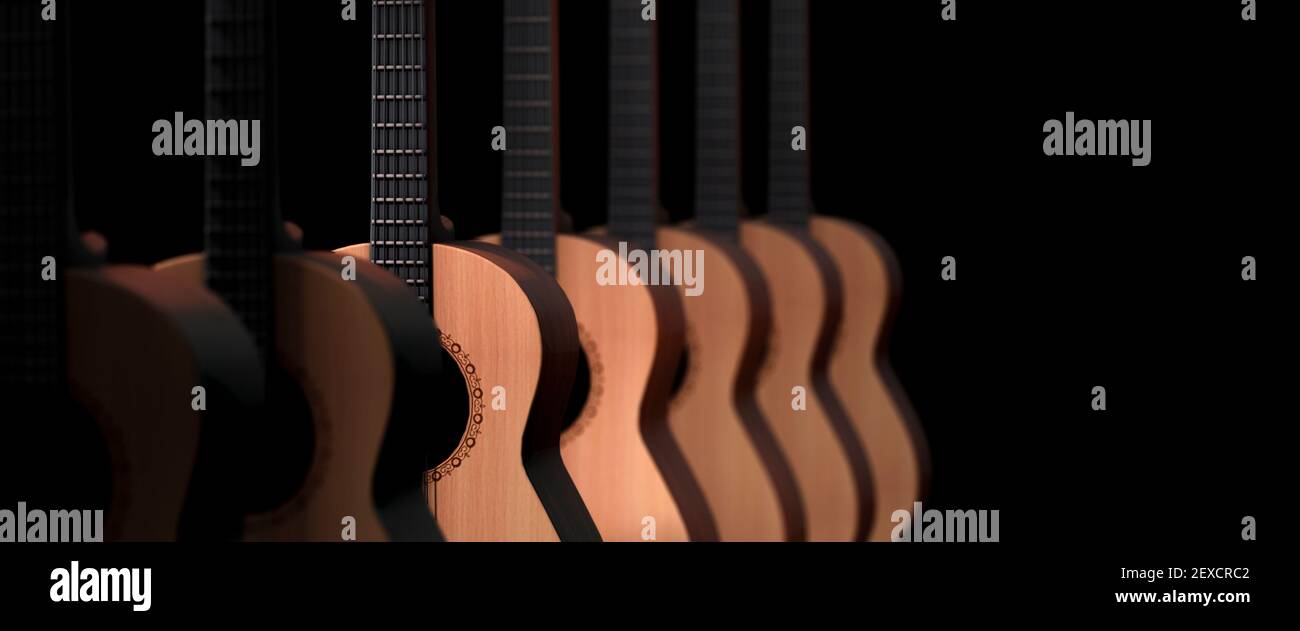 Akustische Gitarren in einer Reihe mit geringer Tiefenschärfe Und ein einzelnes helles Licht vor schwarzem Hintergrund 3D Rendern Stockfoto