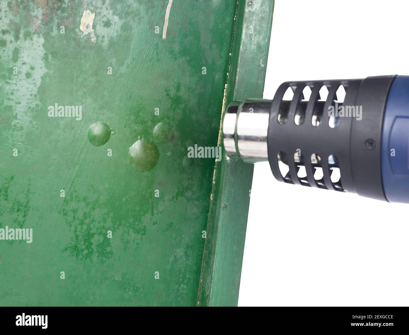 Nahaufnahme einer Lötlampe über grüner Farbe Stockfoto
