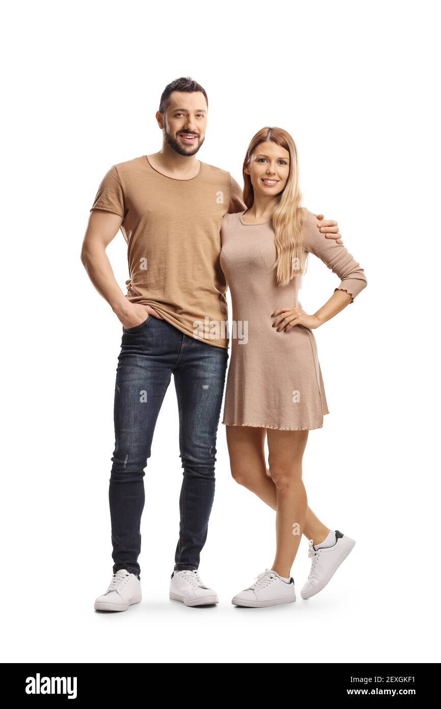 In voller Länge Porträt eines jungen Paares posiert isoliert auf Weißer Hintergrund Stockfoto