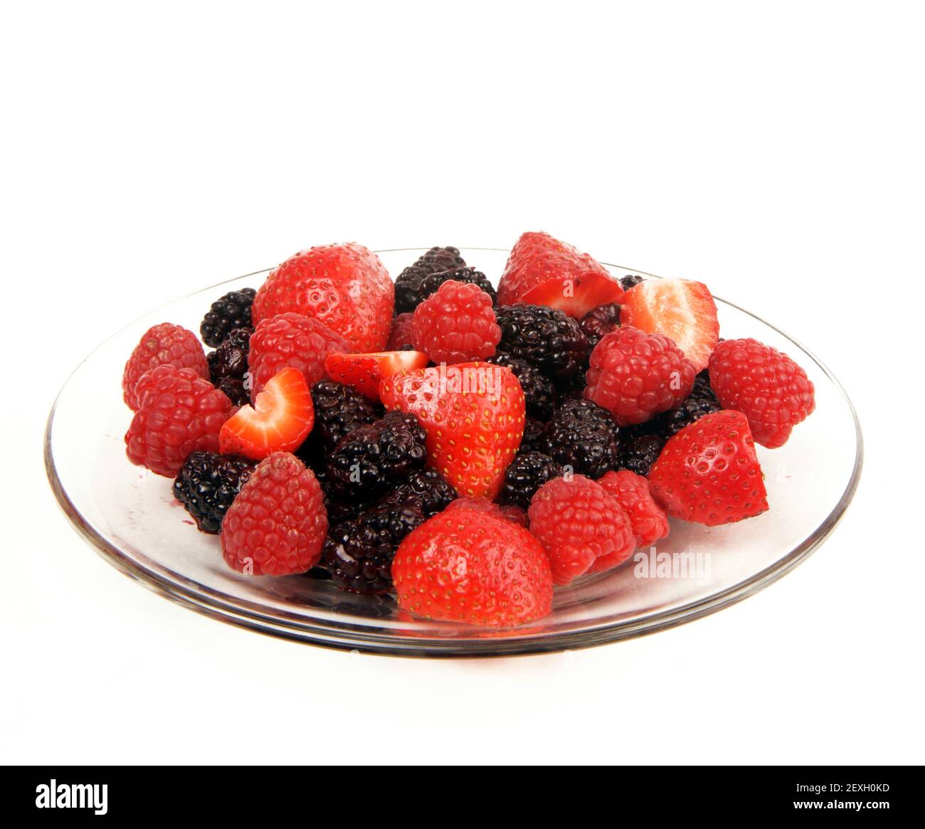 Verschiedenen Rohkost-Obst auf Glas Platte süße Beeren Stockfoto