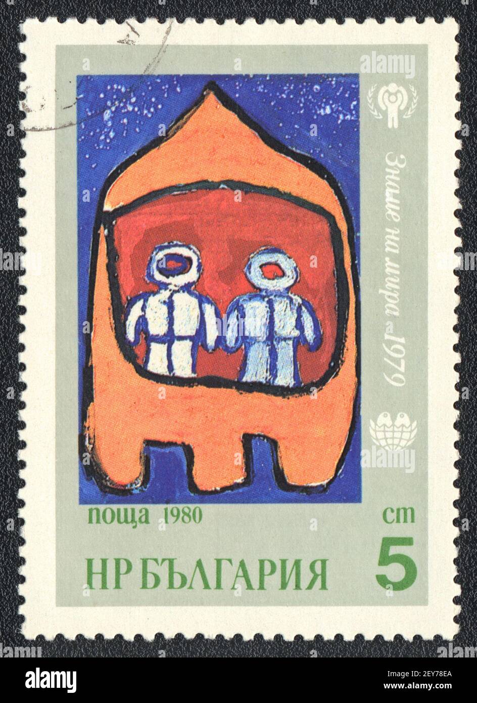 Briefmarke. Friedensfahne 1979 - Bild von einem Kind 'Astronauten' , Bulgarien 1980 Stockfoto