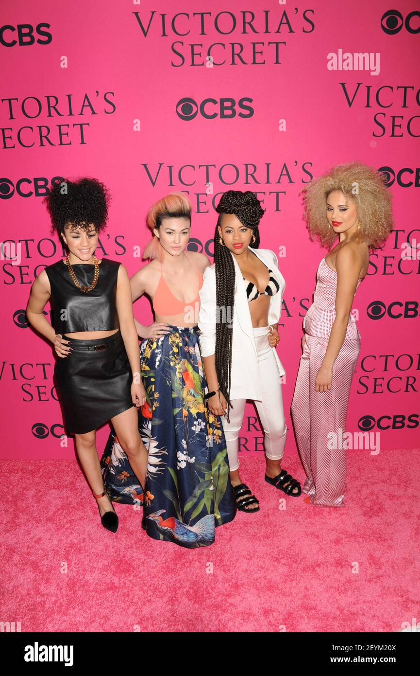 Musikgruppe L-R: Shereen Cutkelvin, Asami Zdrenka, Amira McCarthy, Jess Plummer besuchen die Victoria's Secret Fashion Show 2013, die am Mittwoch, 13. November 2013, in der Lexington Avenue Armory in New York City stattfindet.(Foto: Jennifer Graylock/Sipa USA) Stockfoto