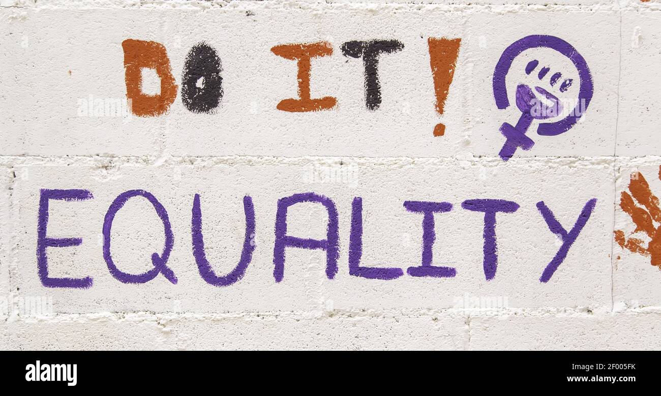 Feministisches Symbol an der Wand, Geschlechtergleichstellung, soziales Problem, sexistische Stockfoto