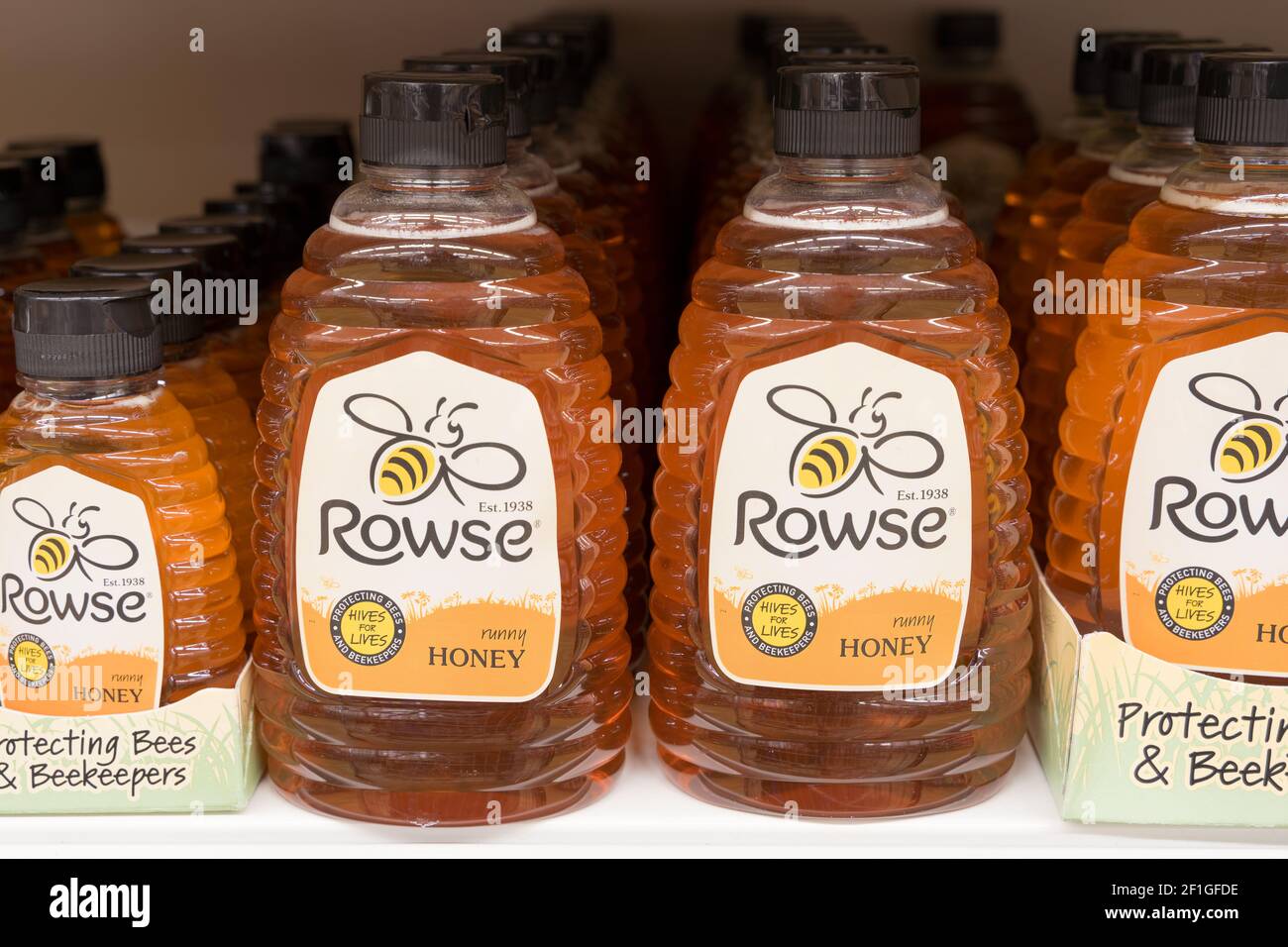 Reihe von Rowse Honig in Flaschen Display auf dem Regal Stockfoto
