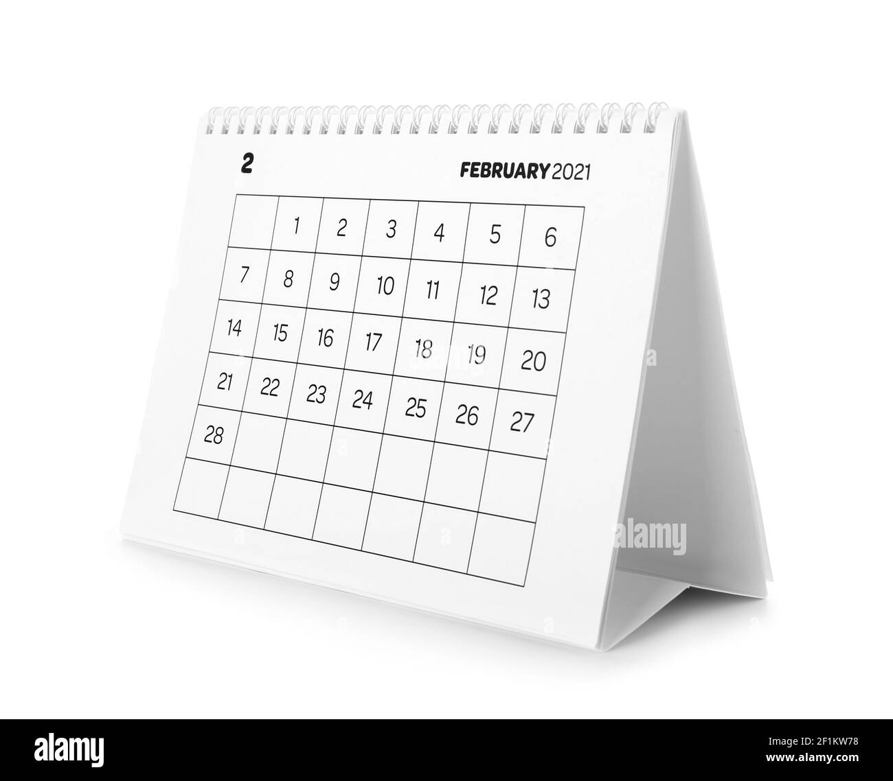 Papierkalender auf weißem Hintergrund drehen Stockfoto