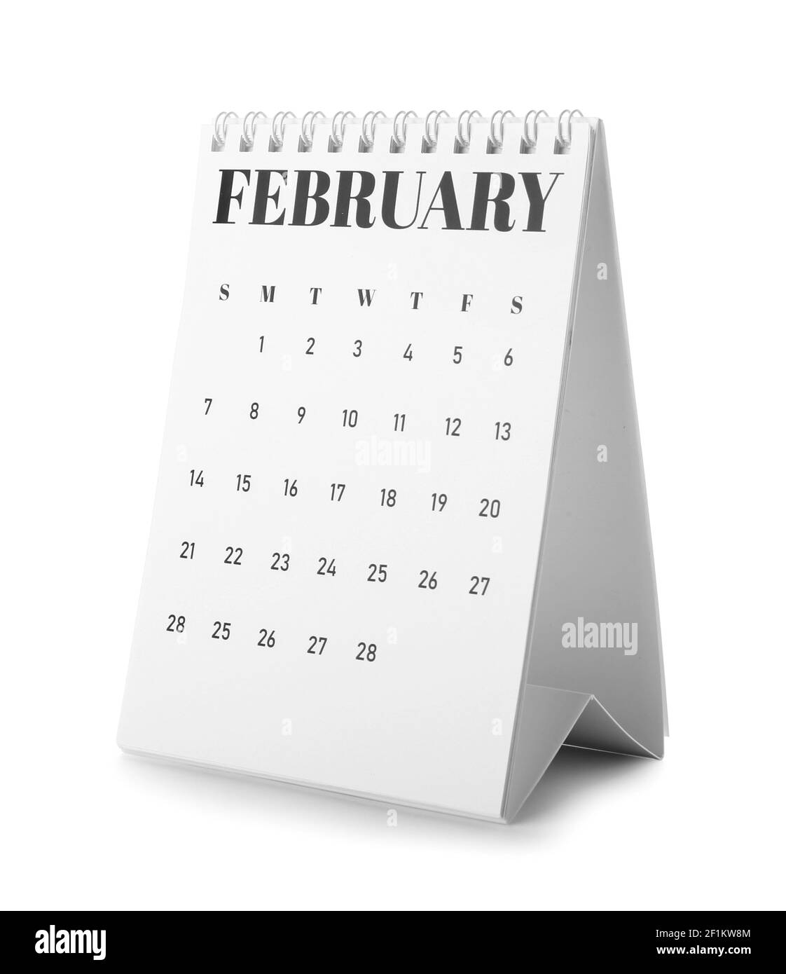 Papierkalender auf weißem Hintergrund drehen Stockfoto