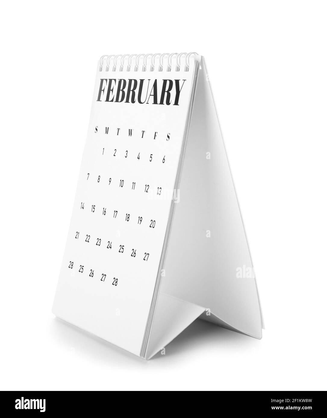 Papierkalender auf weißem Hintergrund drehen Stockfoto