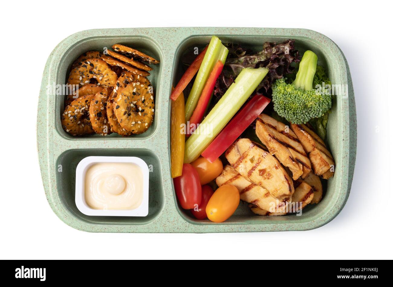 Lunchbox mit leckerem Essen auf weißem Hintergrund Stockfoto