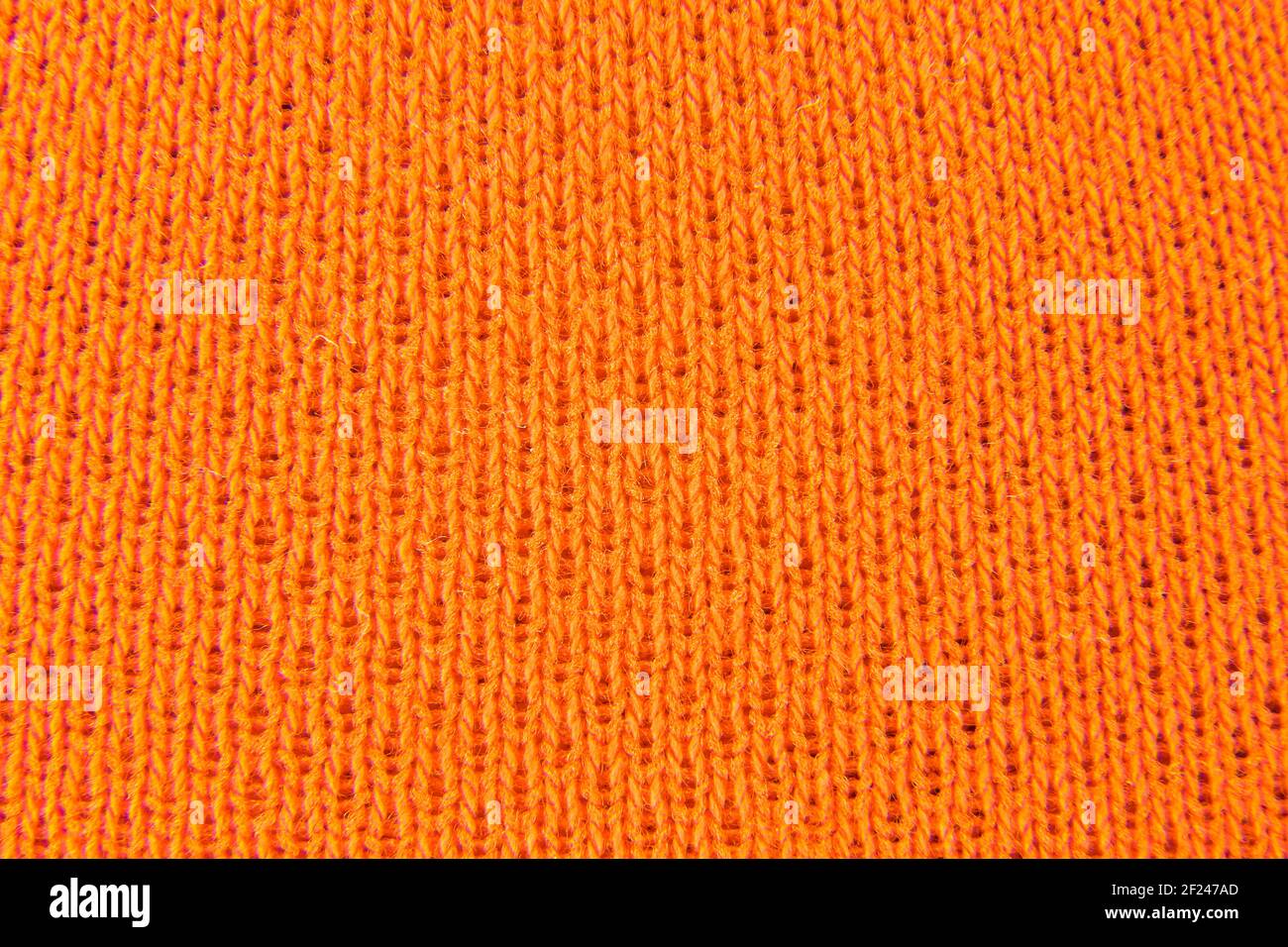 Bild von orange Stoff Hintergrund gestrickt aussehen Stockfoto
