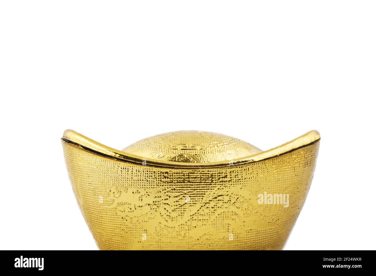 Schuh geformter Goldbarren mit weißem Hintergrund Stockfoto