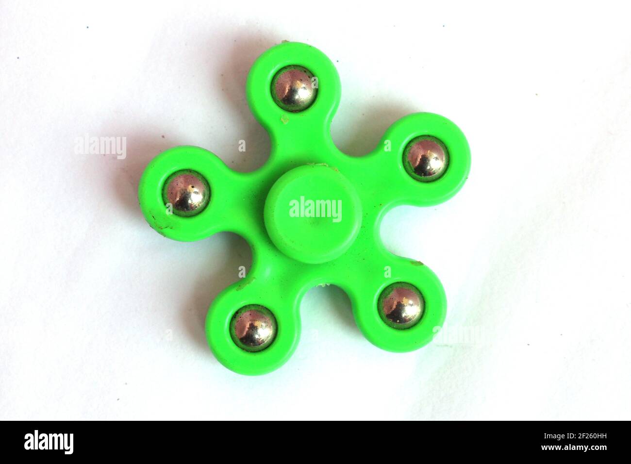 Fidget Spinner, ein Stress Angst Relief Spielzeug auf weißem Hintergrund. Stockfoto