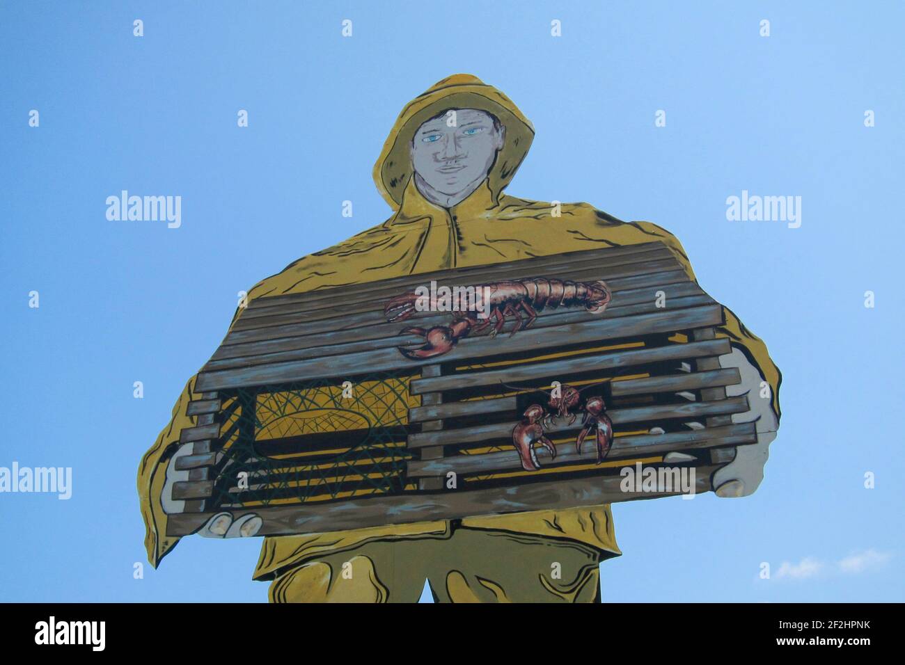 Ein großer Ausschnitt im Freien bemalt Volkskunst hausgemachte Zeichen eines typischen Hummer. In Gouldsboro, Maine. Stockfoto