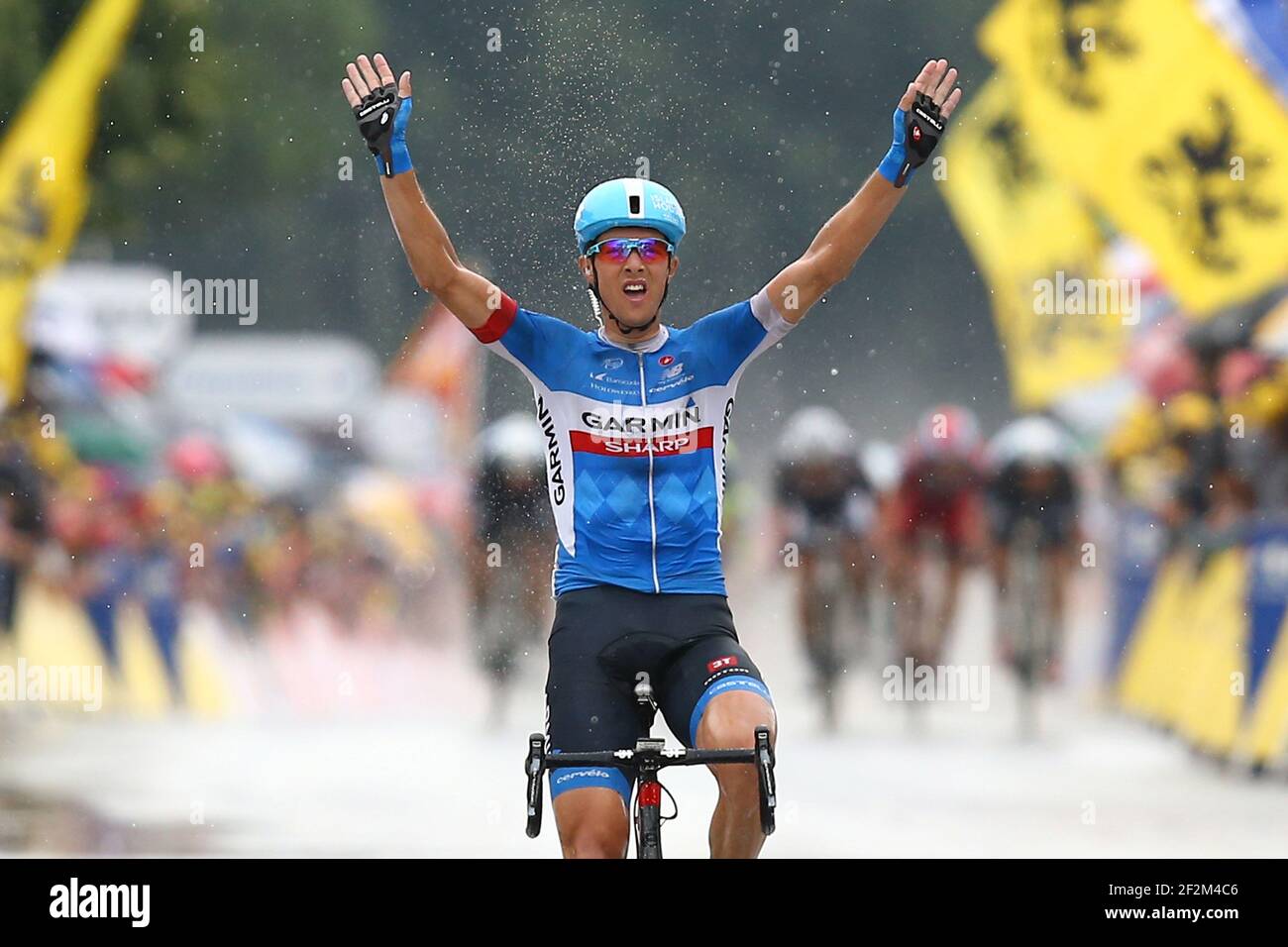 Ramunas Navardauskas aus Litauen fährt für Garmin Sharp feiert, wie er die Ziellinie während der Tour of France überquert, UCI World Tour 2014, Etappe 19, Maubourguet Pays du Val d'Adour - Bergerac (208,5 km), am 25. Juli 2014 - Foto Manuel Blondau / AOP Press / DPPI Stockfoto