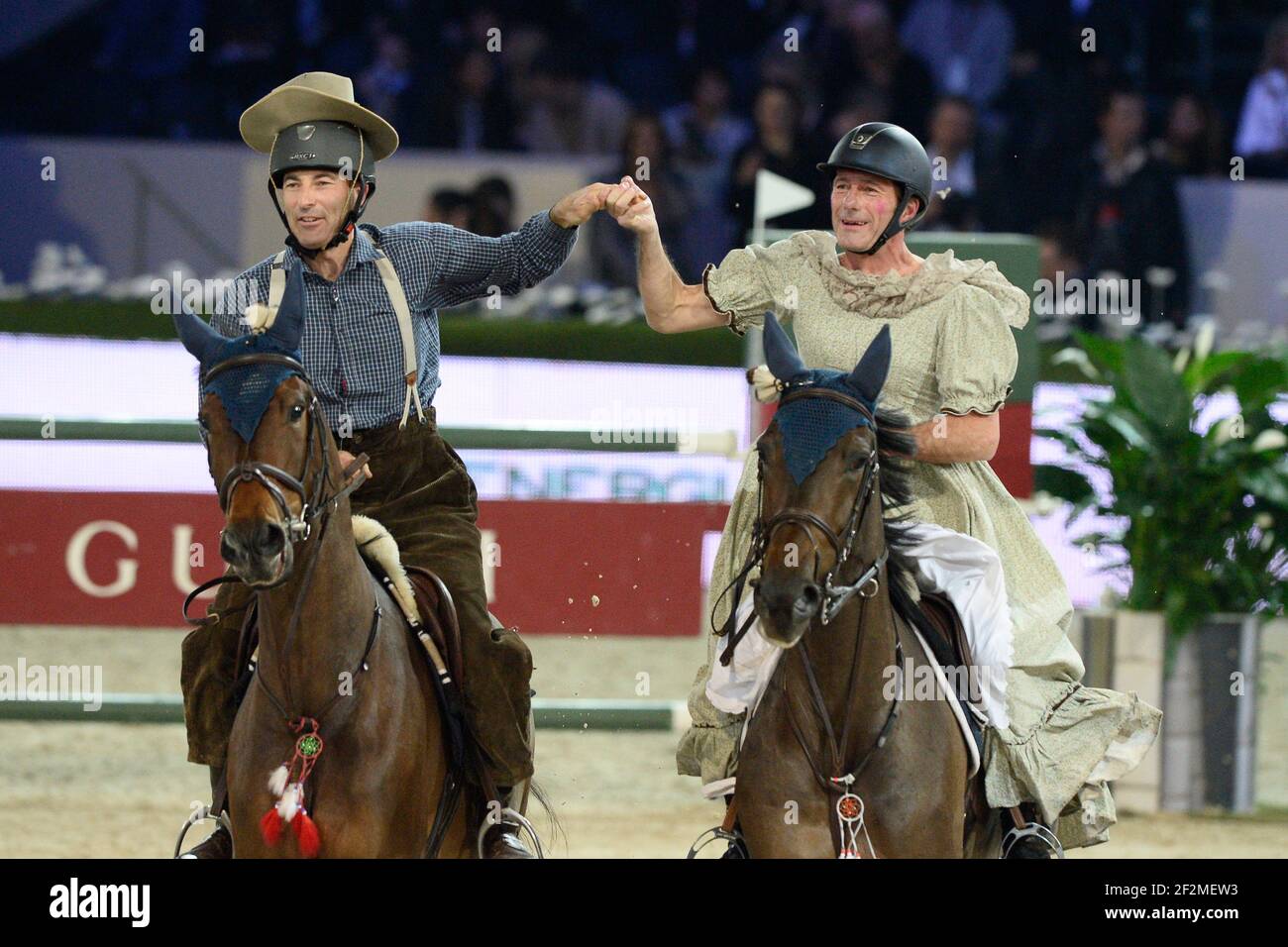 Nicolas Canteloup (Charles Ingalls) mit Vincent Bartin auf Cramba du Ruisseau Z während des Style and Competition for amade Competition Paris Gucci Masters am 7th 2014. Dezember im Parc des Expositions in Paris Nord Villepinte, Frankreich. Foto Christophe Bricot / DPPI Stockfoto