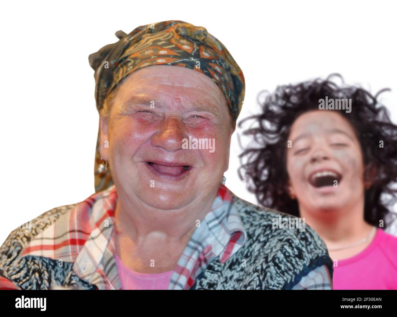 Frau mit rotem interessanten Gesicht und kleines Mädchen lachen Stockfoto