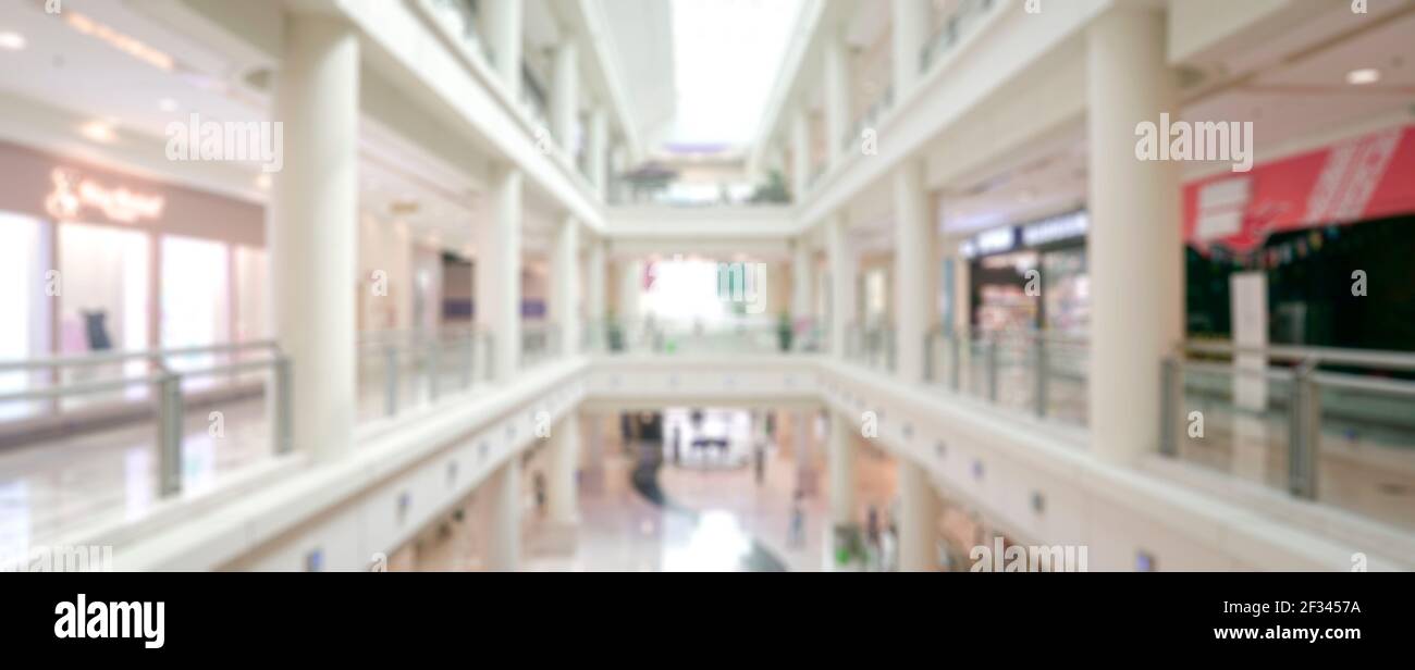 Abstrakte Unschärfe mit Bokeh und unscharf Einkaufszentrum oder Kaufhaus für Hintergrund. Stockfoto