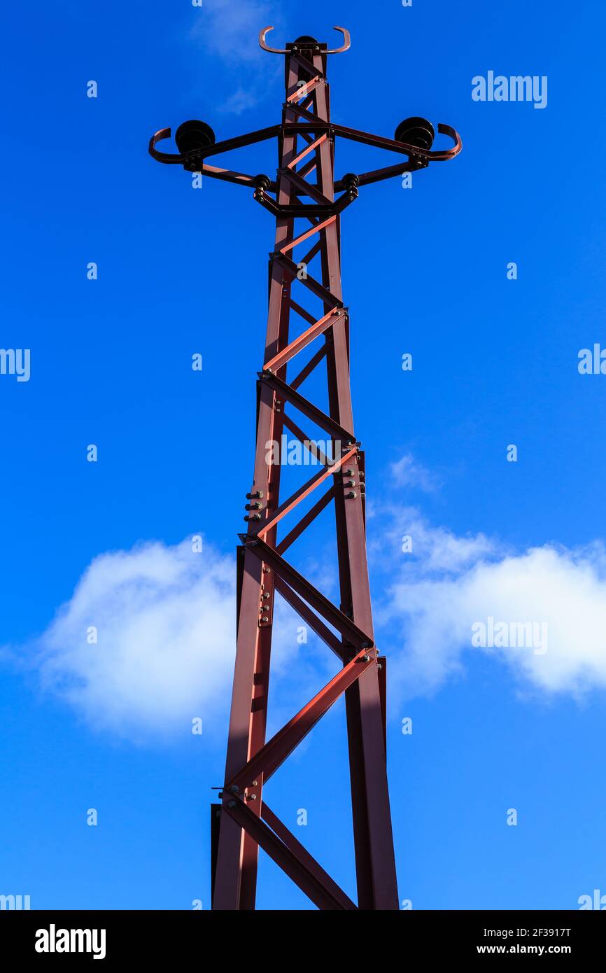 Ein Strommast des frühen 20th. Jahrhunderts in Waihi, Neuseeland Stockfoto