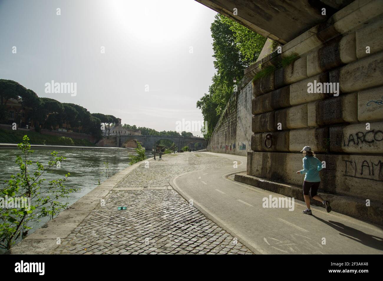 Läufer, Lungo Tevere, Insel Isola Tiberina, Rom, Italien, Europa Stockfoto