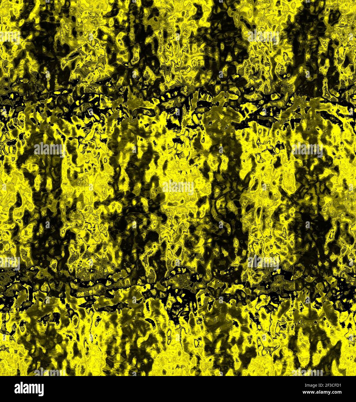 Ein abstraktes Muster in verschwommenem öligen Gelb und dunklen Farben Stockfoto