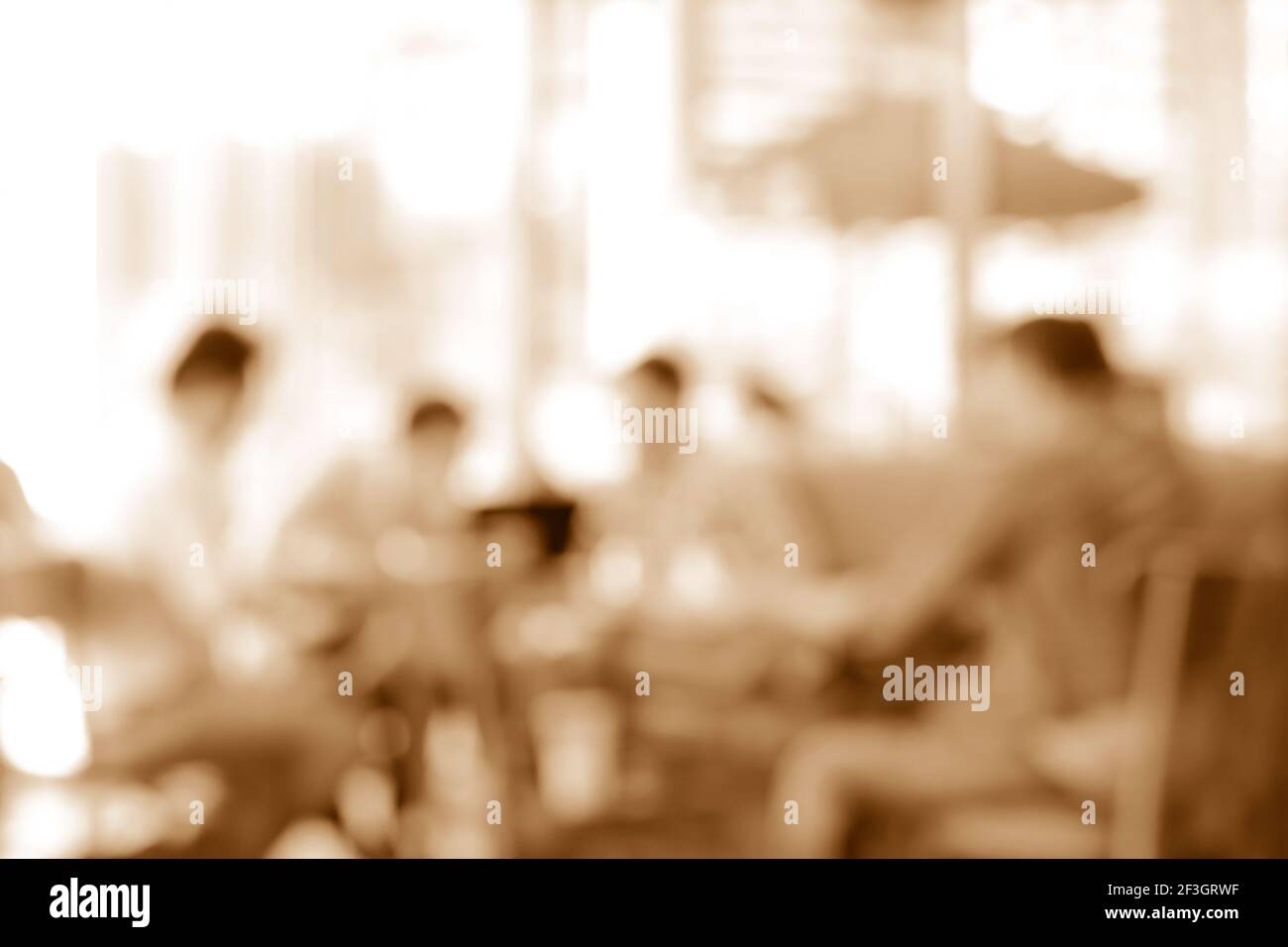 Verschwommenes Bild von Menschen im Café sitzen, Sepia-Ton - kann als Hintergrund verwendet werden Stockfoto