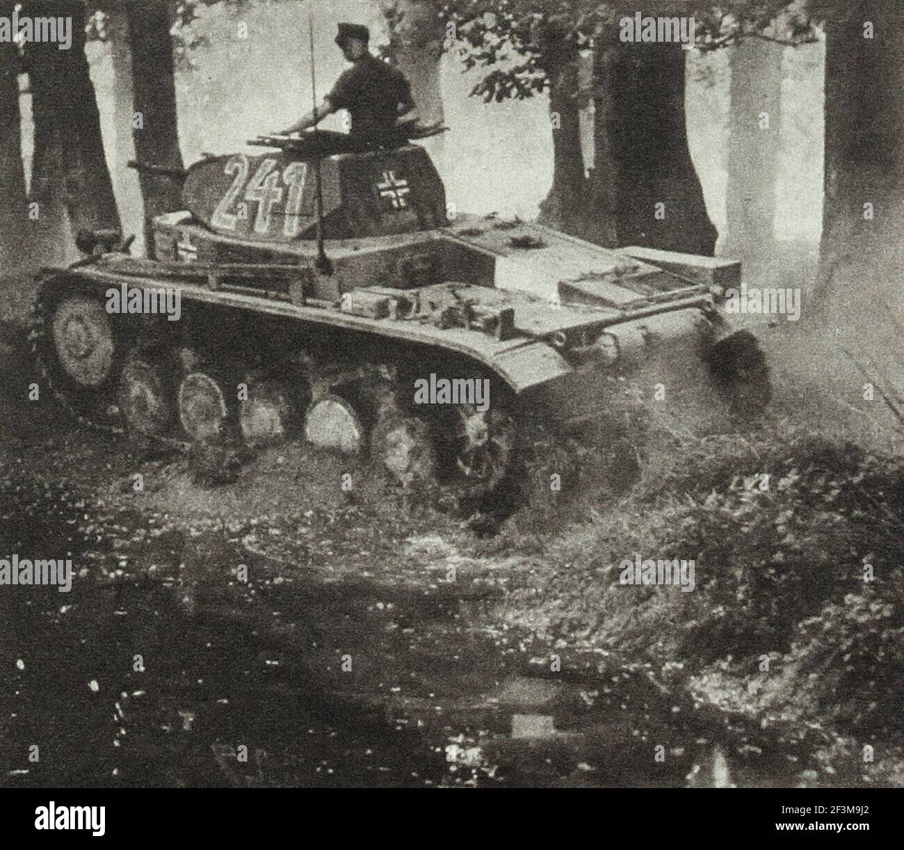 Weltkrieg II Periode aus deutschen Propaganda Nachrichten. Deutsche Panzerbesatzung während der Invasion Polens. 1939 Stockfoto