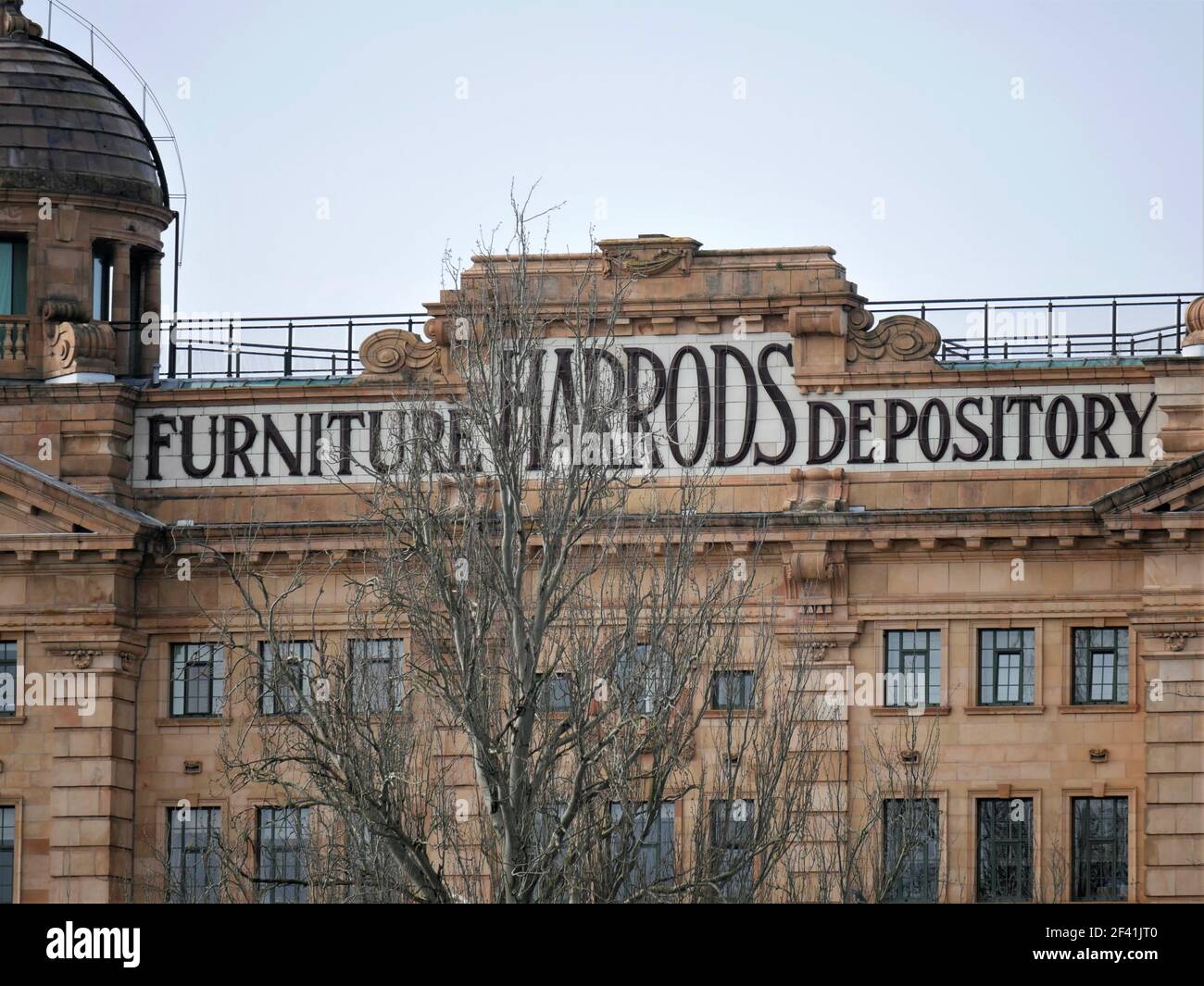 Harrods Furniture Depository Buildings on the South Bank of the River Thames near Hammersmith Bridge in Barnes, London, now known as Harrods Village Stockfoto