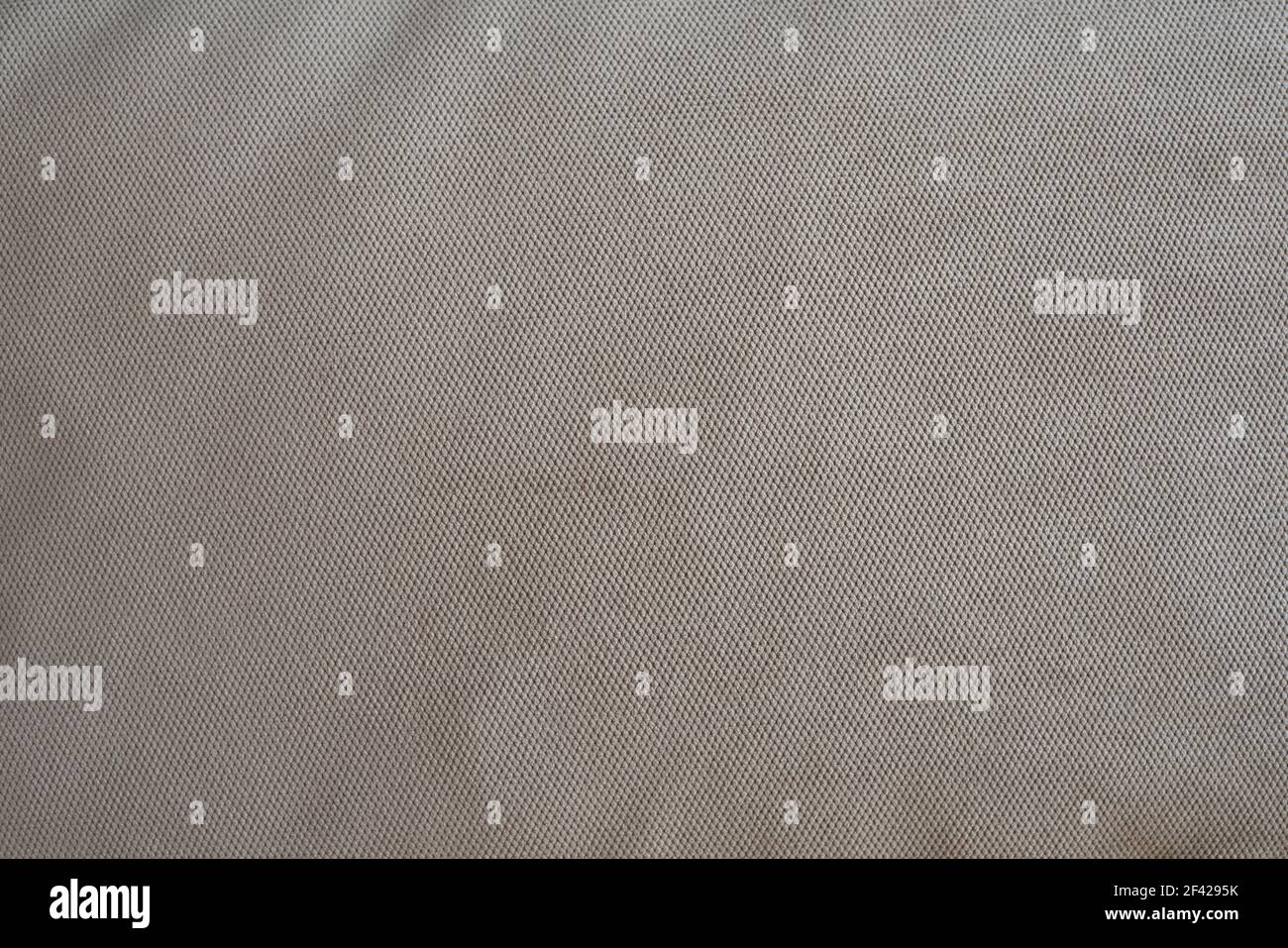 Die Textur des Polsterstoffes ist grau-blau. Cord-Struktur. Samt. Stockfoto