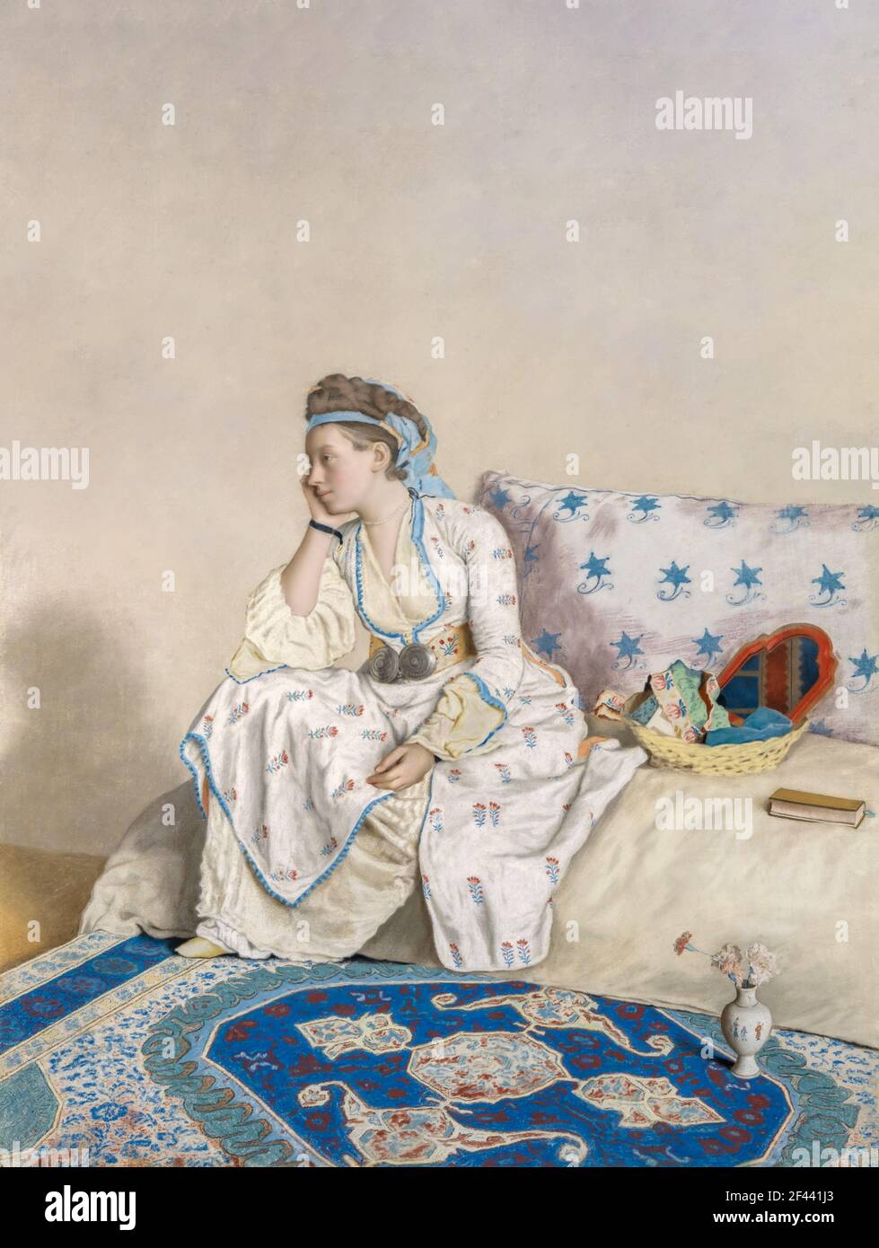 Porträt von Marie Fargues, Ehefrau des Künstlers, in türkischer Tracht. Lange sitzend auf einer Couch. Der Kopf liegt auf der rechten Hand. Auf dem Divan ar Stockfoto