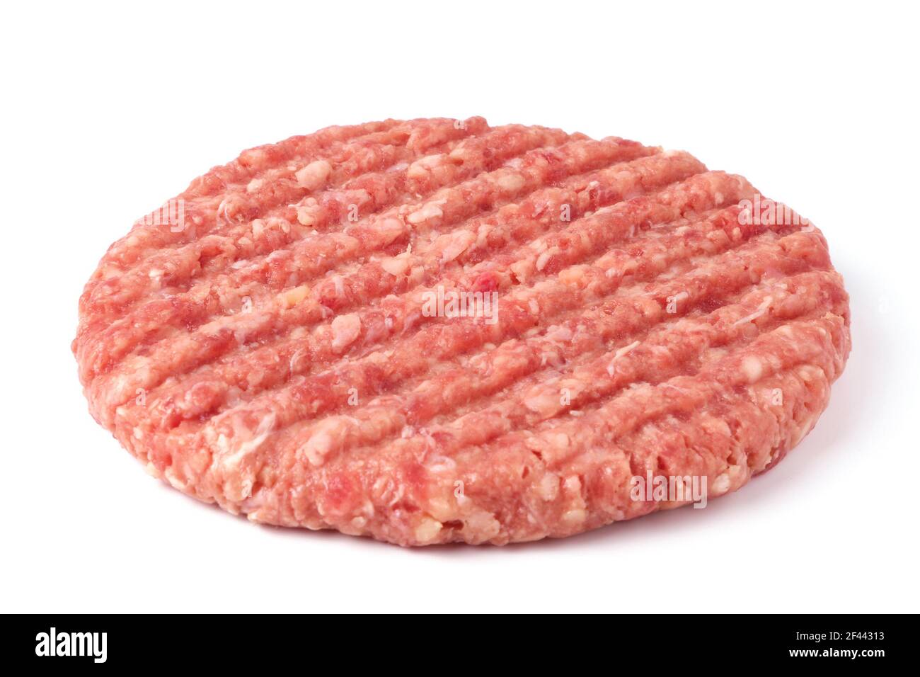 Rohes Rindfleisch Burger Cutlet isoliert auf weiß Stockfoto