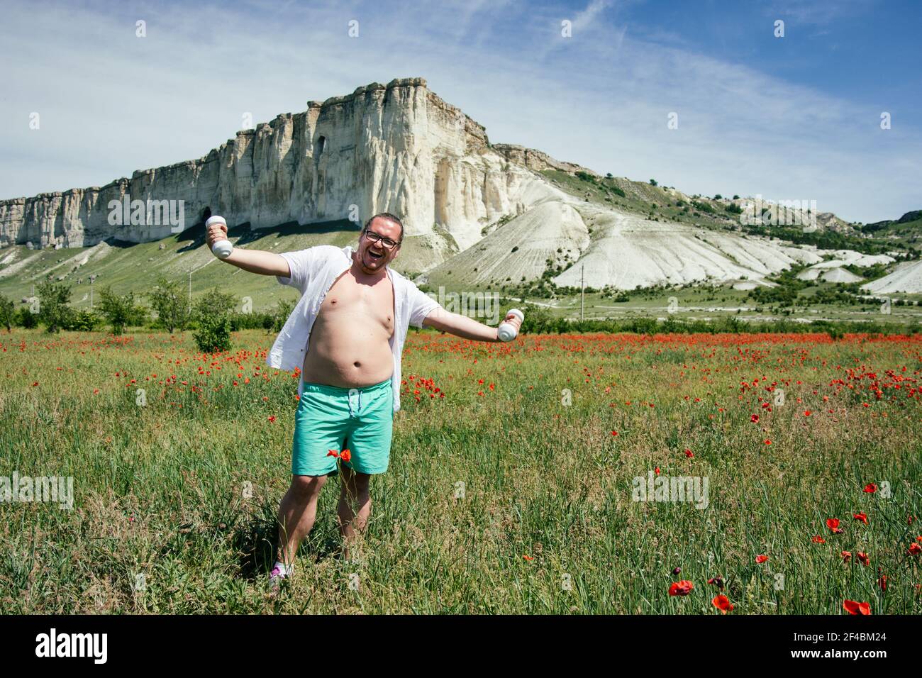 Sport und gesunder Lebensstil. Lustige fette Mann und Fitness. Stockfoto