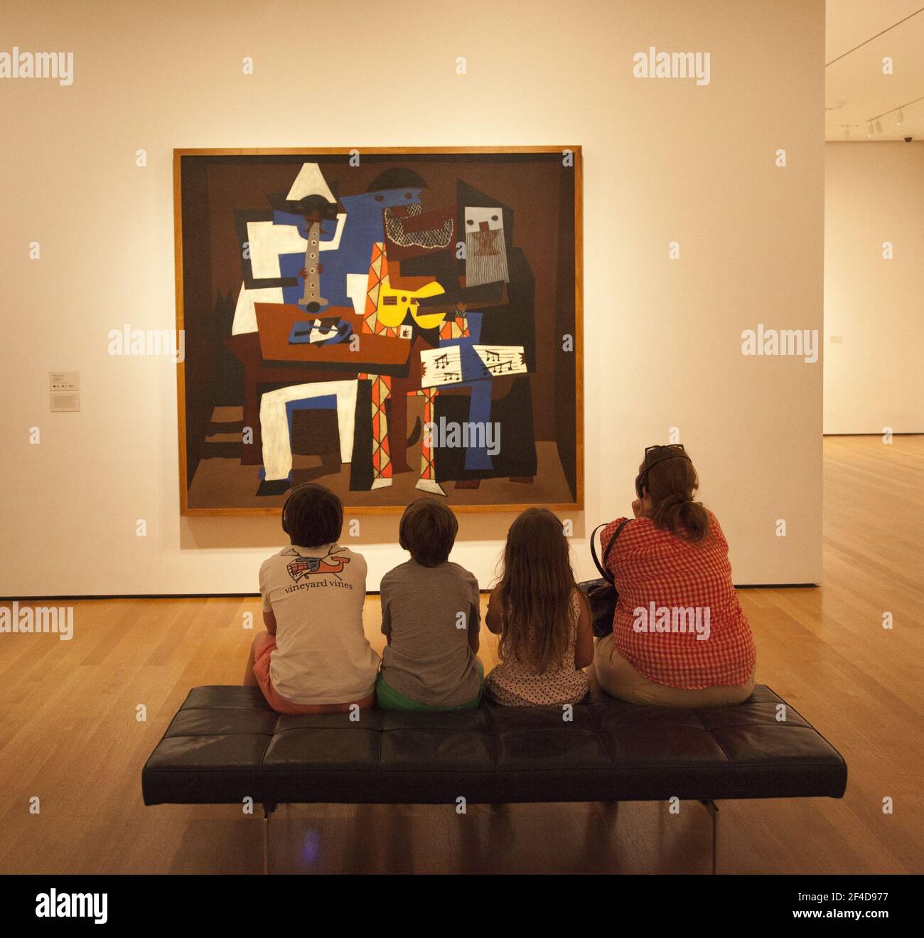 Das Konzert hören: Pablo Picasso, drei Musiker im Museum of Modern Art, MoMA, in New York City. Stockfoto