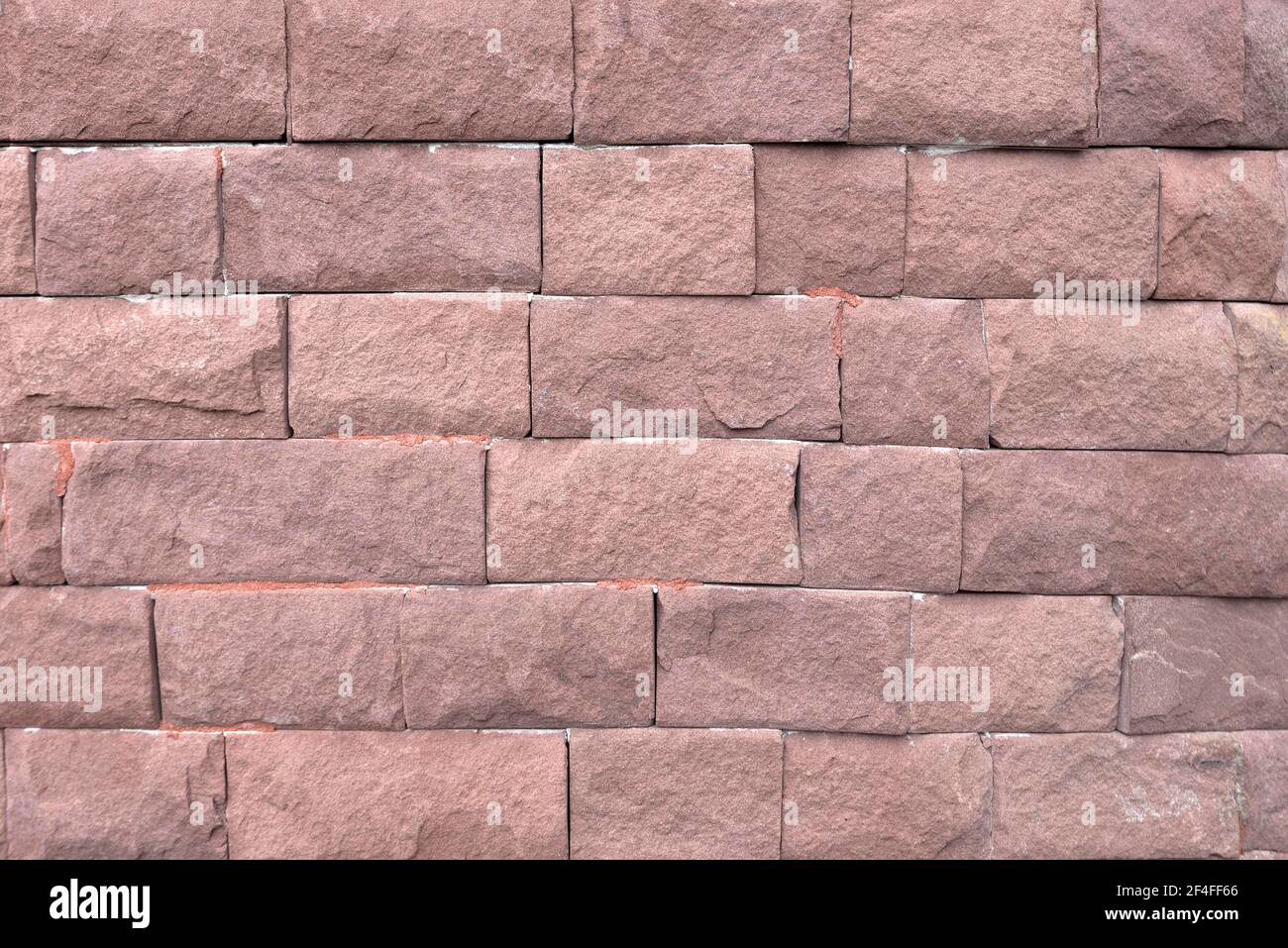 Sandsteinwand mit geschliffenem Stein, Bayern, Deutschland Stockfoto
