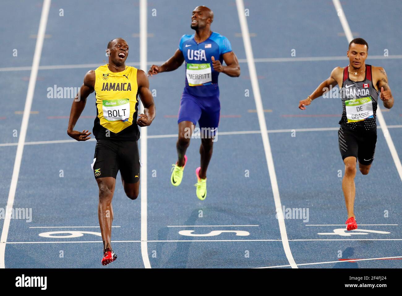 Usain Bolt von Jamaica Running gewinnt Goldmedaille 200 m Sprintrennen, Rio 2016 Olympischen Sommerspiele. Silber an Andre De Grasse, Bronze Christophe Lemaitre Stockfoto