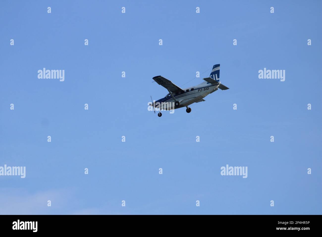 Ein Quest Kodiak 100 Flugzeug von SIL Aviation gefangen Im Flug Stockfoto