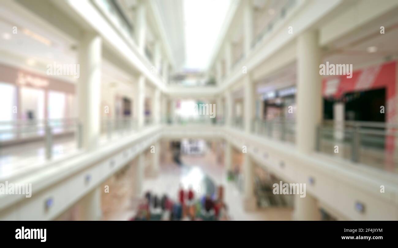 Abstrakte Unschärfe mit Bokeh und unscharf Einkaufszentrum oder Kaufhaus für Hintergrund. Stockfoto