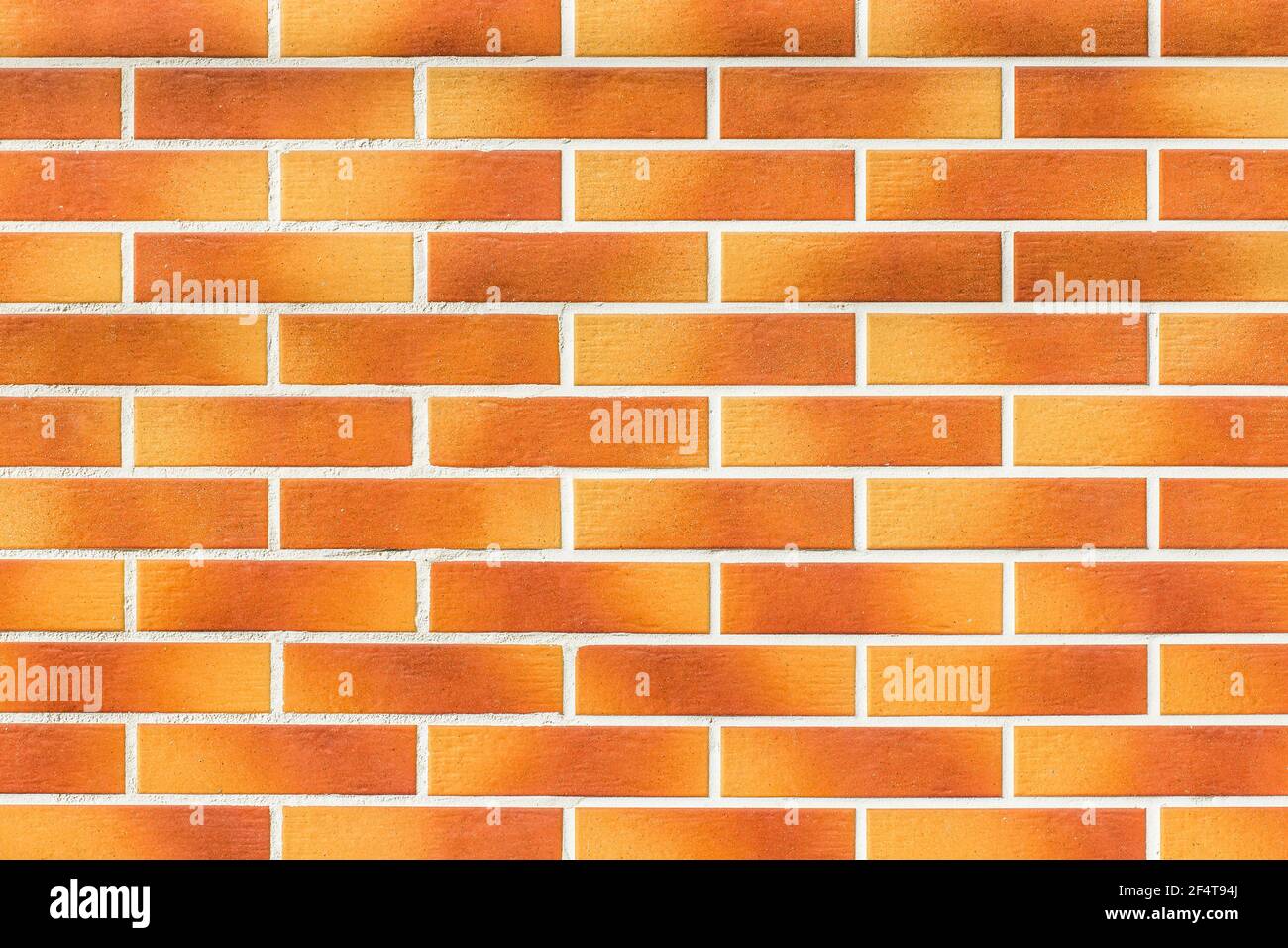 Orange und braun modernen Innenraum Backstein Wand Textur Hintergrund. Stockfoto