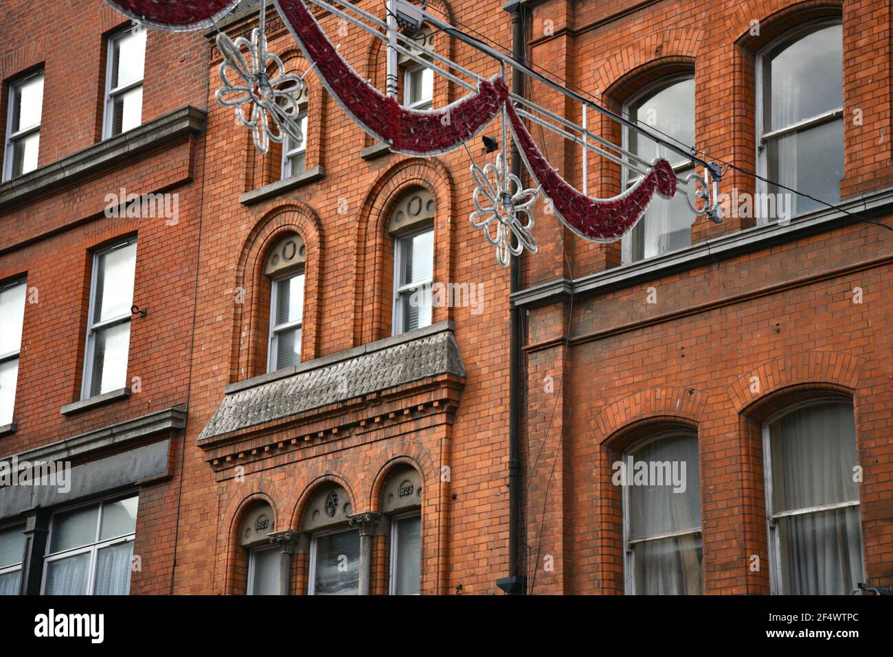 Alte Backsteingebäude im georgianischen Stil an der Grafton Street in Dublin, Irland. Stockfoto