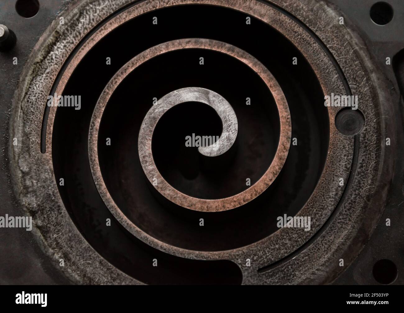 Metall Spirale Teil Mechanismus industriellen Hintergrund Nahaufnahme Stockfoto