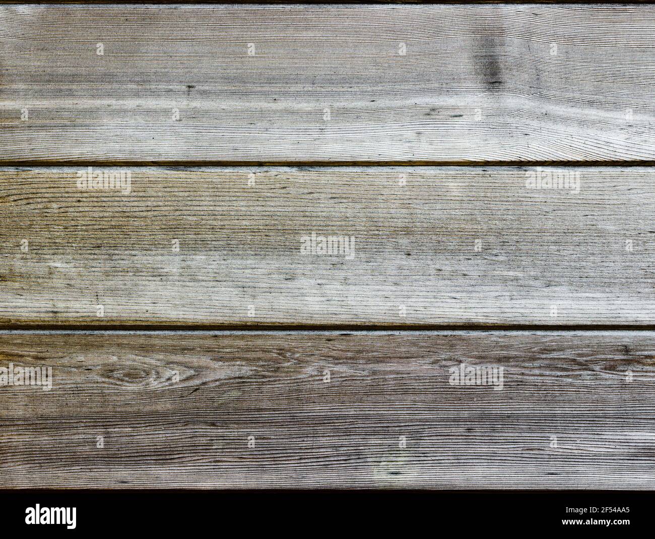 Drei horizontale Naturholzplatten hell und silber in der Farbe Stockfoto