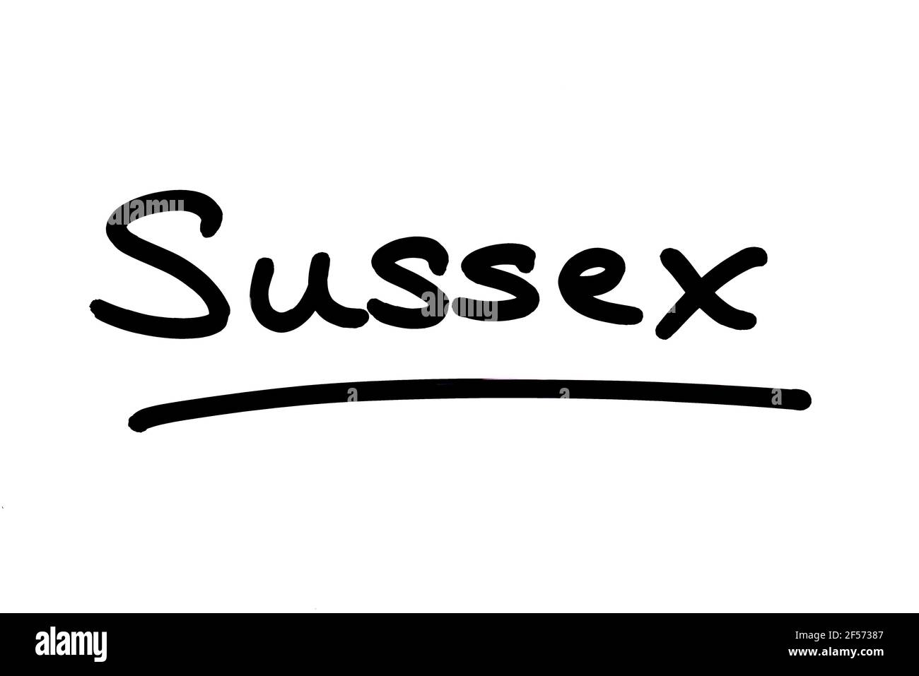 Sussex, handgeschrieben auf weißem Hintergrund. Stockfoto