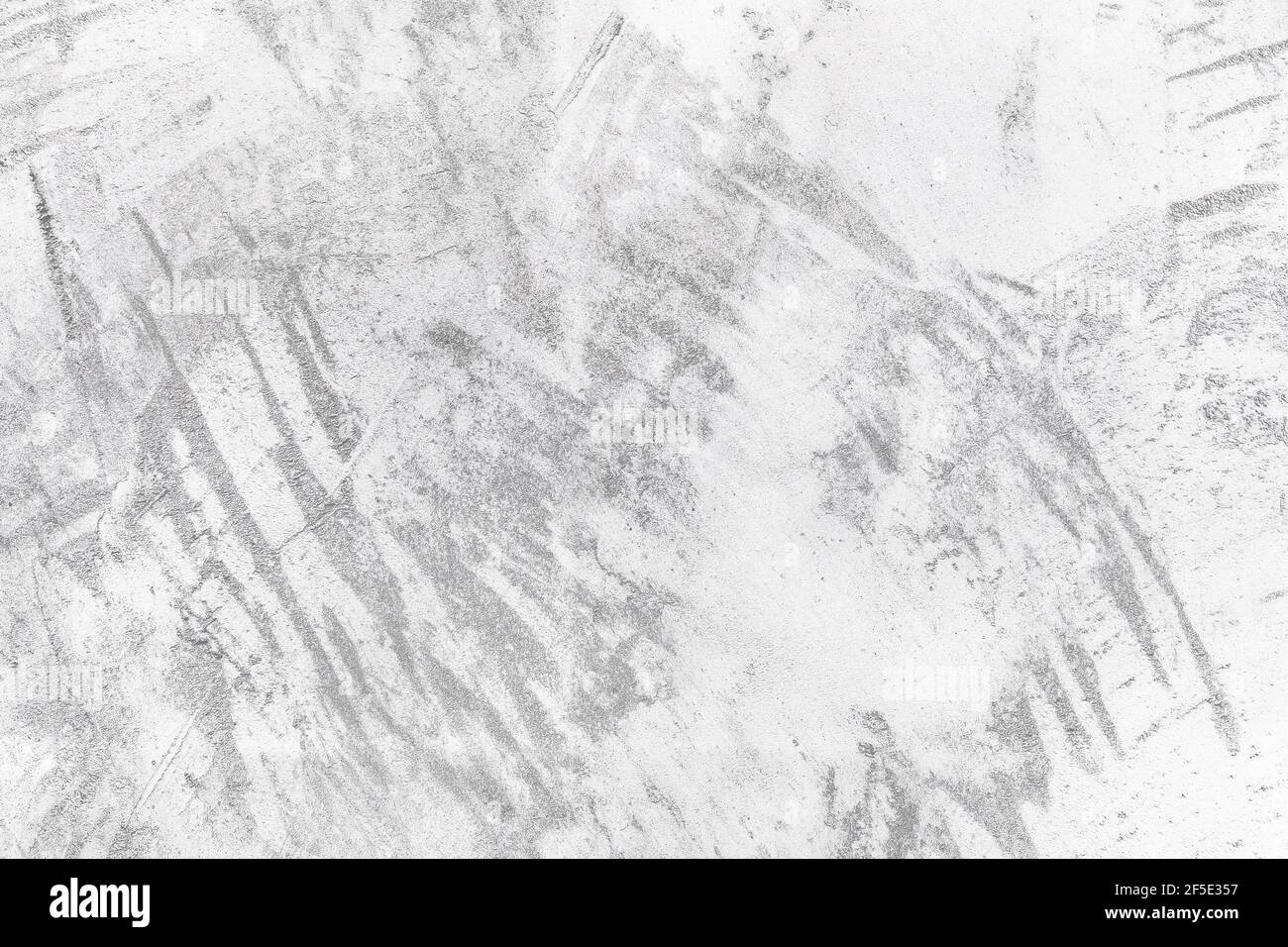 Alte weiße Betonwand Textur mit abstraktem Muster, Gebäude Hintergrund. Stockfoto