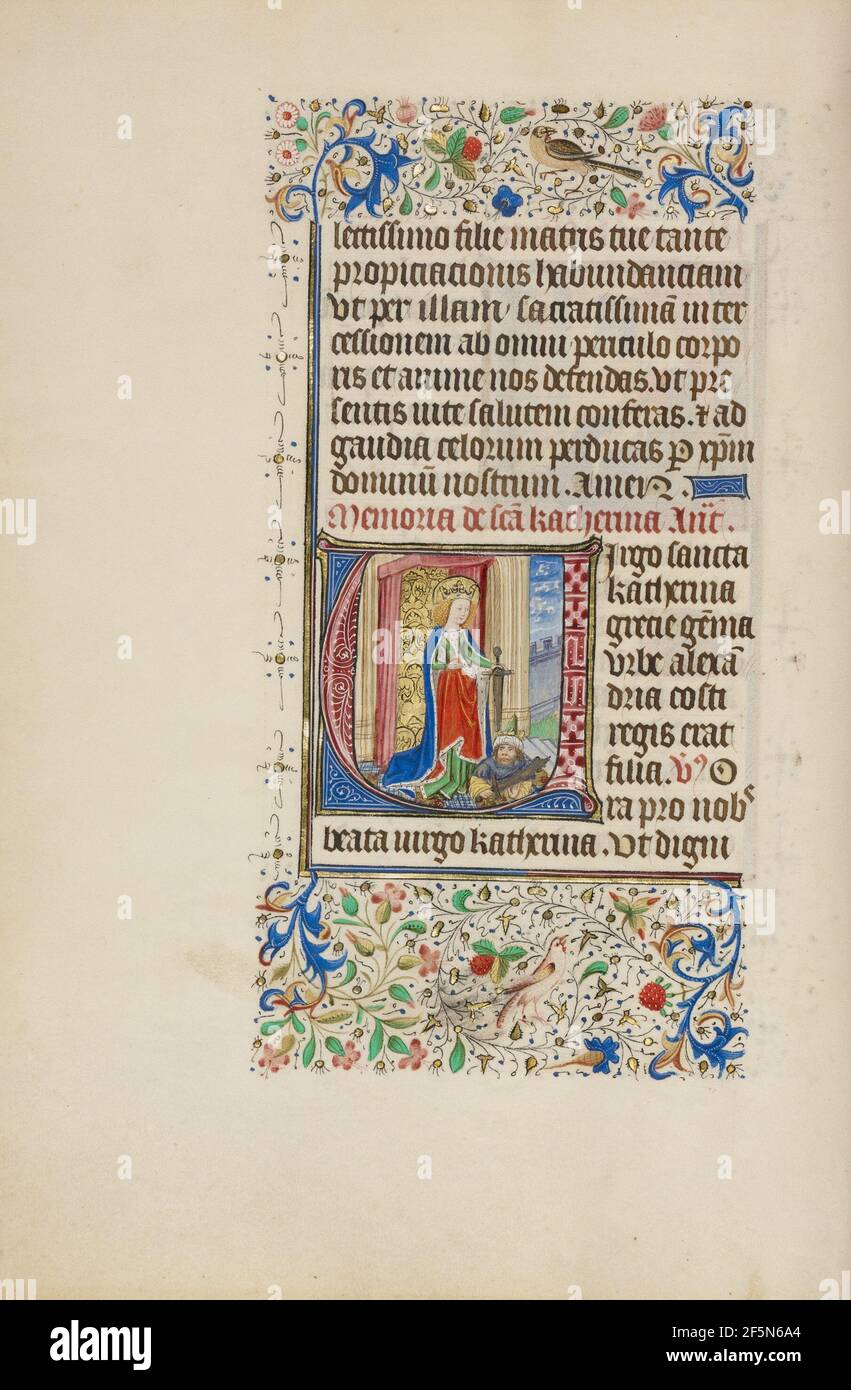 Initial V: Heilige Katharina hält ein Schwert über einem König. Meister der Llangattock Stunden (flämisch, aktiv um 1450 - 1460) Stockfoto
