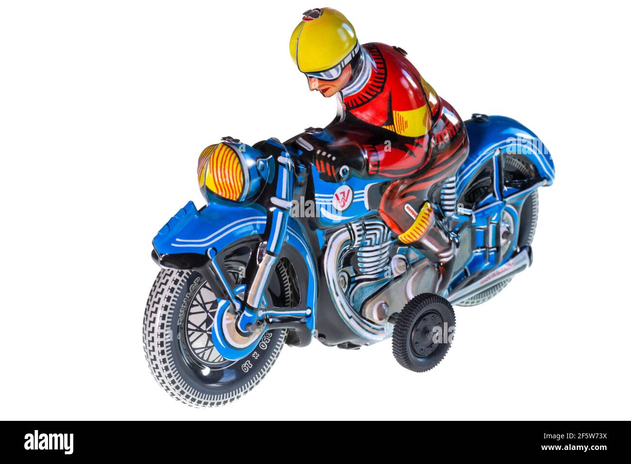 Motorradfahrer auf weißem Hintergrund, Blechspielzeug hergestellt in Deutschland von 1952, Deutschland Stockfoto