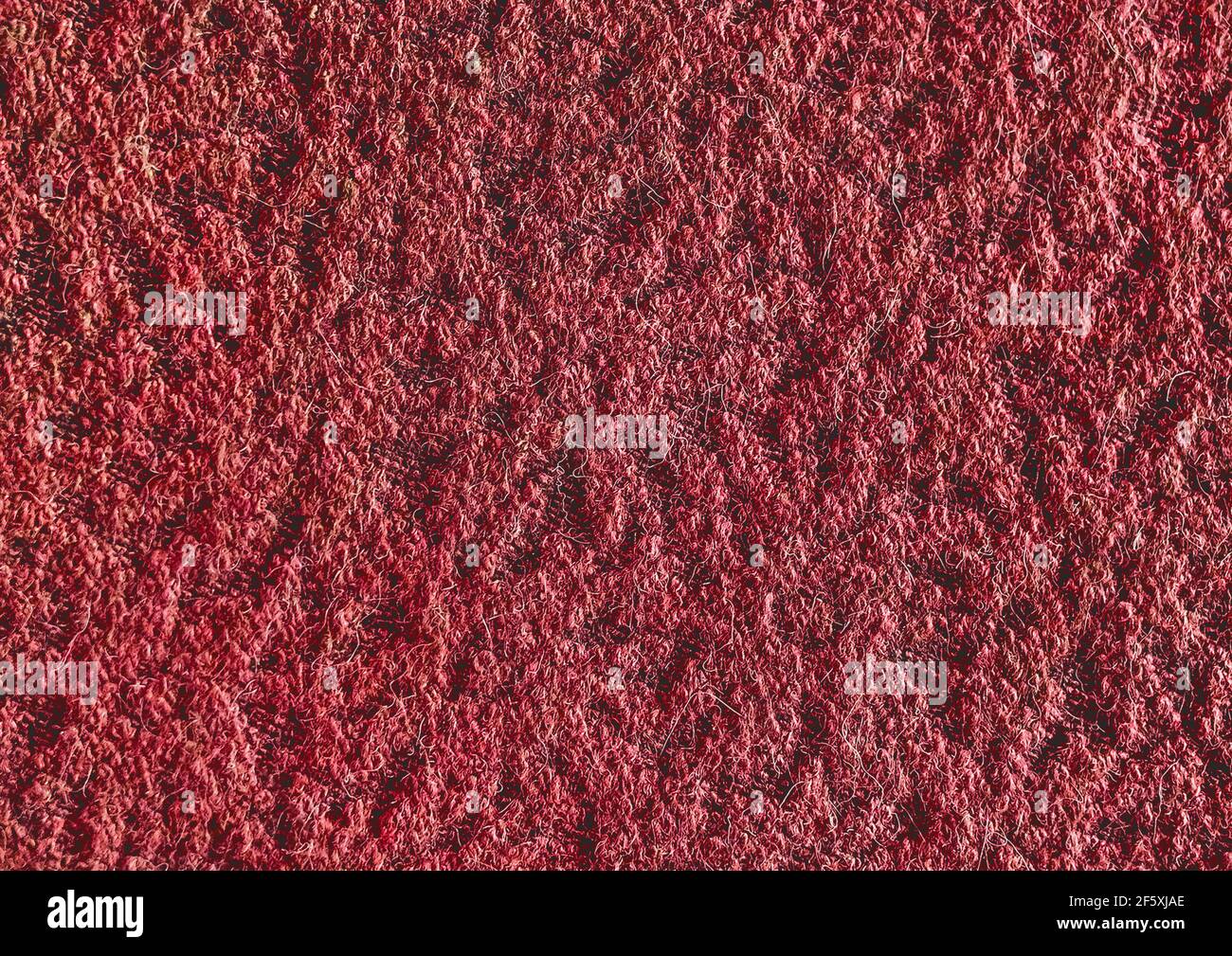 Rote abstrakte Stoffmuster, Textil-Material Textur Stoff Hintergrund. Stockfoto