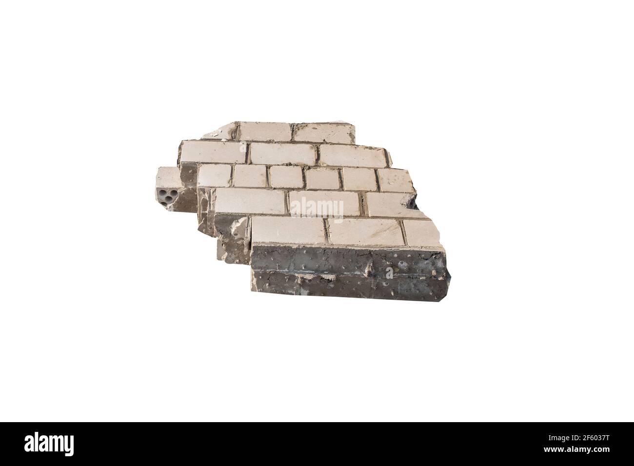 Stück einer zerstörten Wand aus weißem Ziegel isoliert vor einem weißen Hintergrund. Hochwertige Fotos Stockfoto