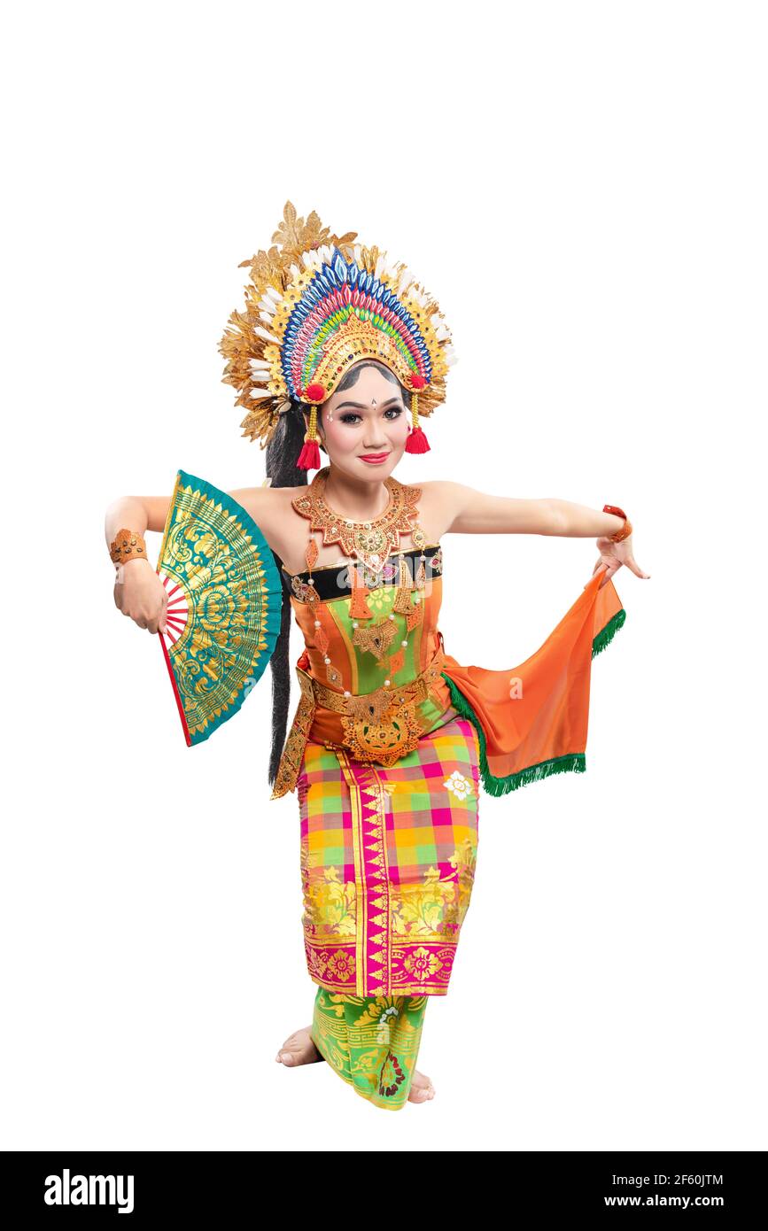 Asiatische Frau tanzen balinesischen traditionellen Tanz isoliert auf weißem Hintergrund Stockfoto