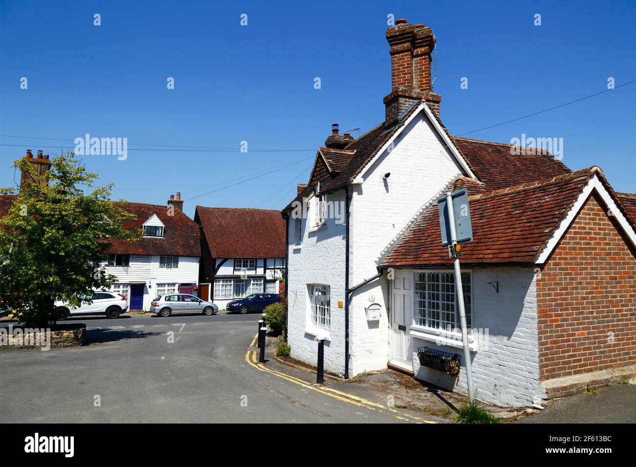 Typische weiß bemalte historische Hütten, Hartfield, East Sussex, England Stockfoto