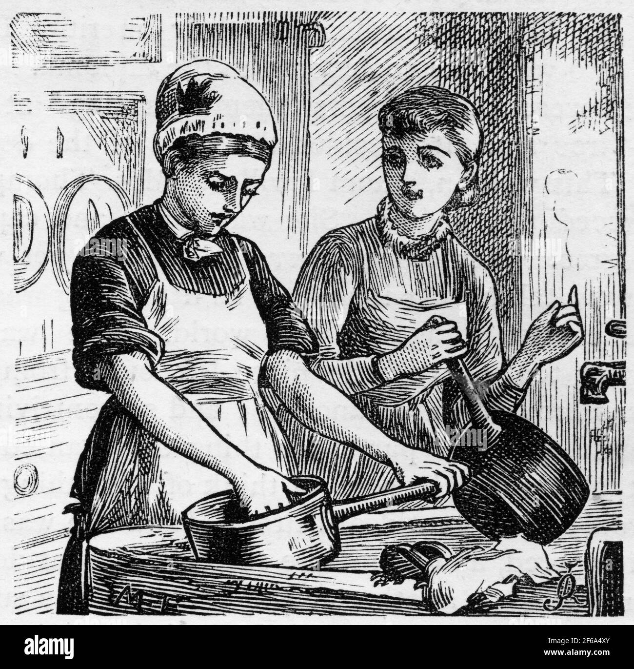 Gravur von zwei jungen Spülmädchen, die Geschirr in einem waschen viktorianische Küche Stockfoto